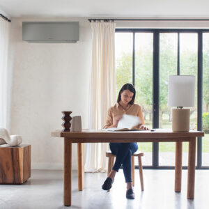 Daikin Emura silver wall-mounted aircon in home office or study