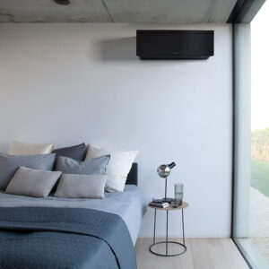 Daikin Emura Black indoor aircon unit placed in a bedroom
